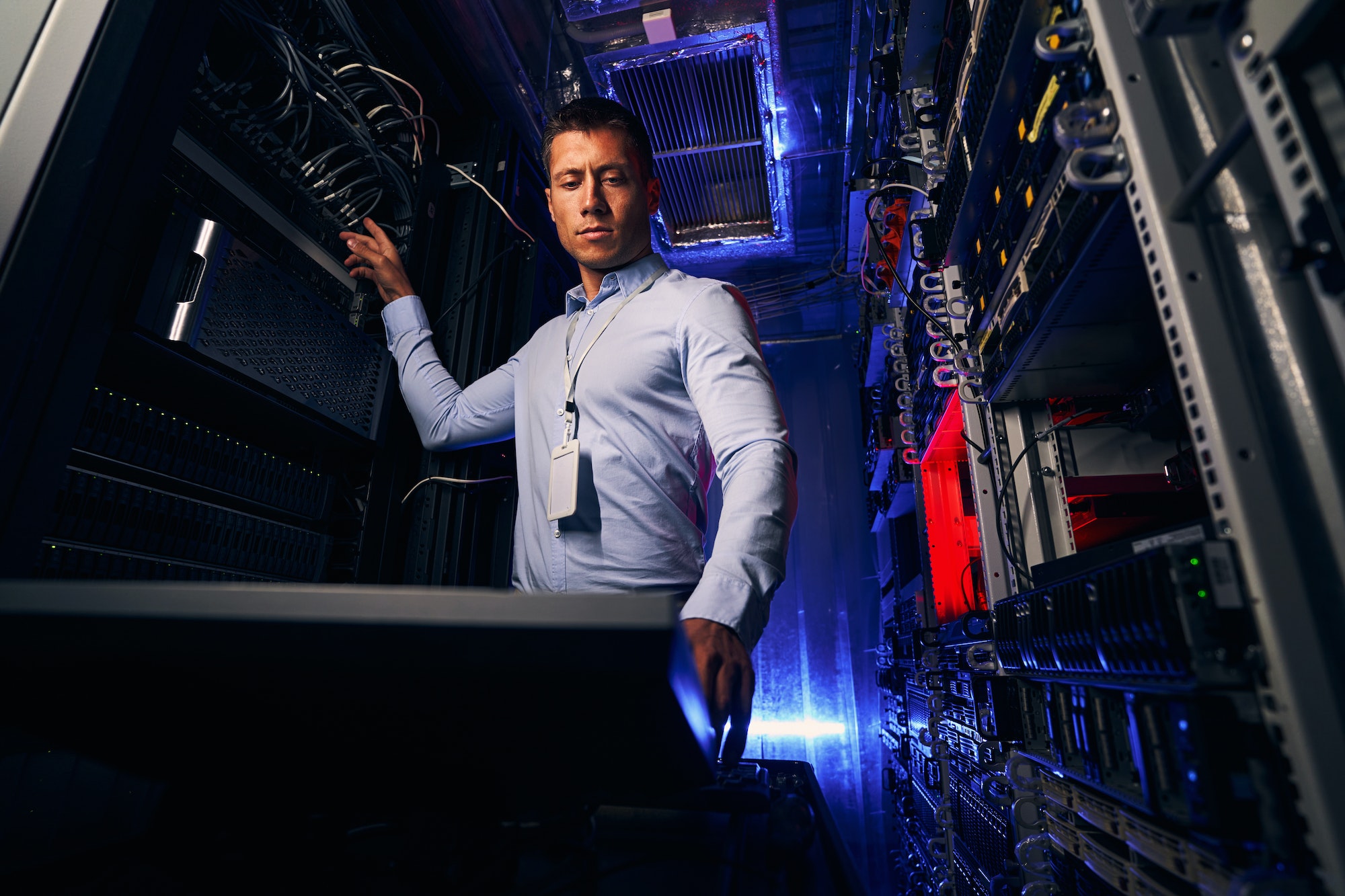 Data center engineer setting up network infrastructure
