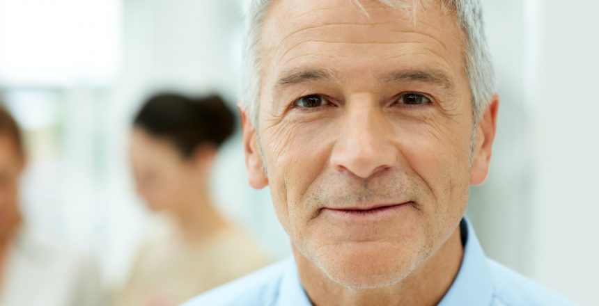 closeup portrait of confident senior business man