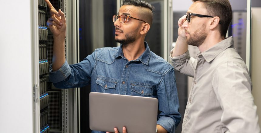 network engineers working with supercomputer